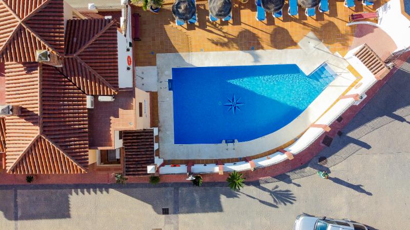 Aerial view of Villa Burriana with pool and terraces in Nerja